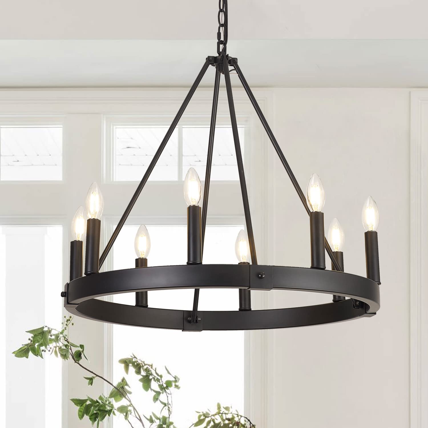 Alolvios 8-light wagon wheel chandelier over dining table adds warm ambience