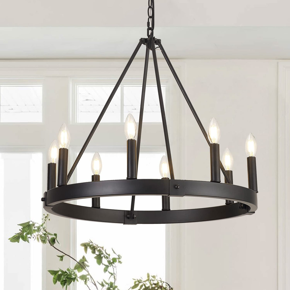 Alolvios 8-light wagon wheel chandelier over dining table adds warm ambience