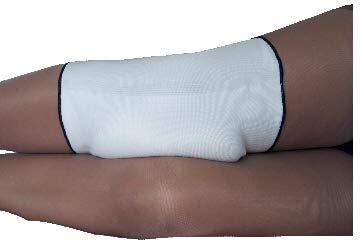 Alpha Medical knee pad worn by a side sleeper for gentle knee support.