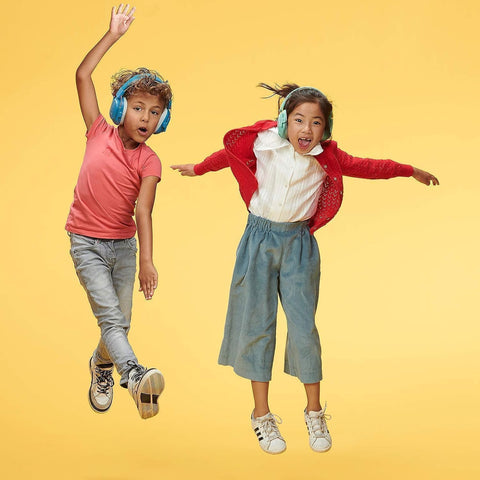 Child wearing Alpine Muffy Kids headphones during daily activities for calmer listening.