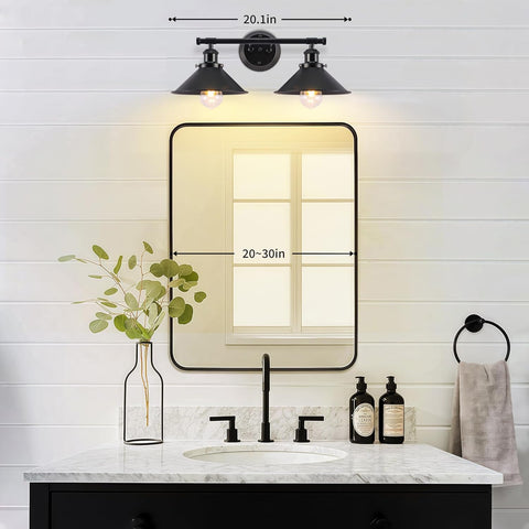Alynzee wall sconce over mirror in matte black enhances rustic-industrial bathroom style