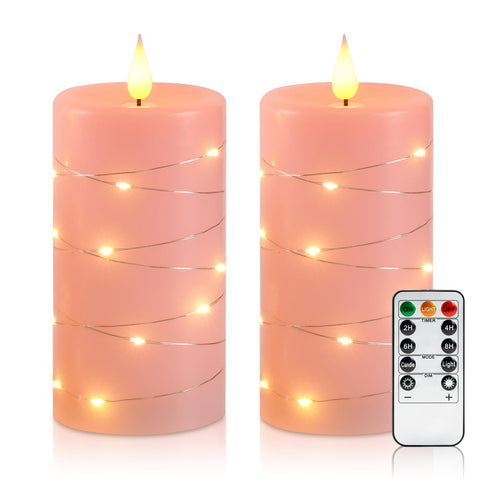 Amagic pink flameless candles with string lights for a cozy, romantic glow.