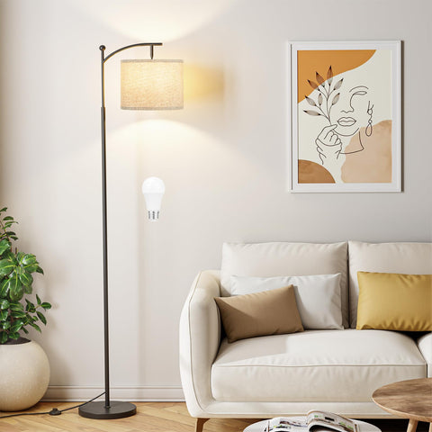 Ambimall 60-inch floor lamp with grey shade and black pole lights a modern living room.