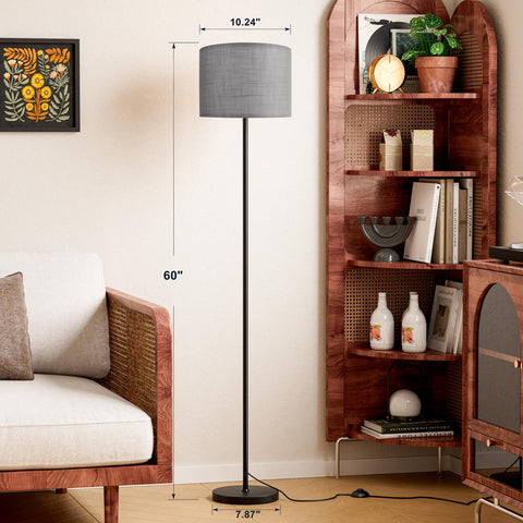 Ambimall linen grey shade with black pole lighting a modern living room.