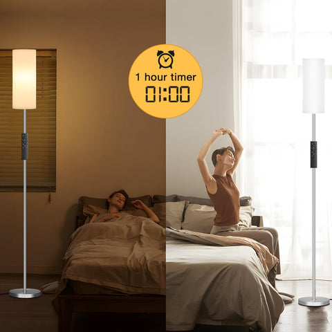 Ambimall slender lamp with white shade and silver pole.
