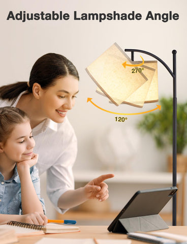 Ambimall lamp with rotating beige shade directs light for reading or work