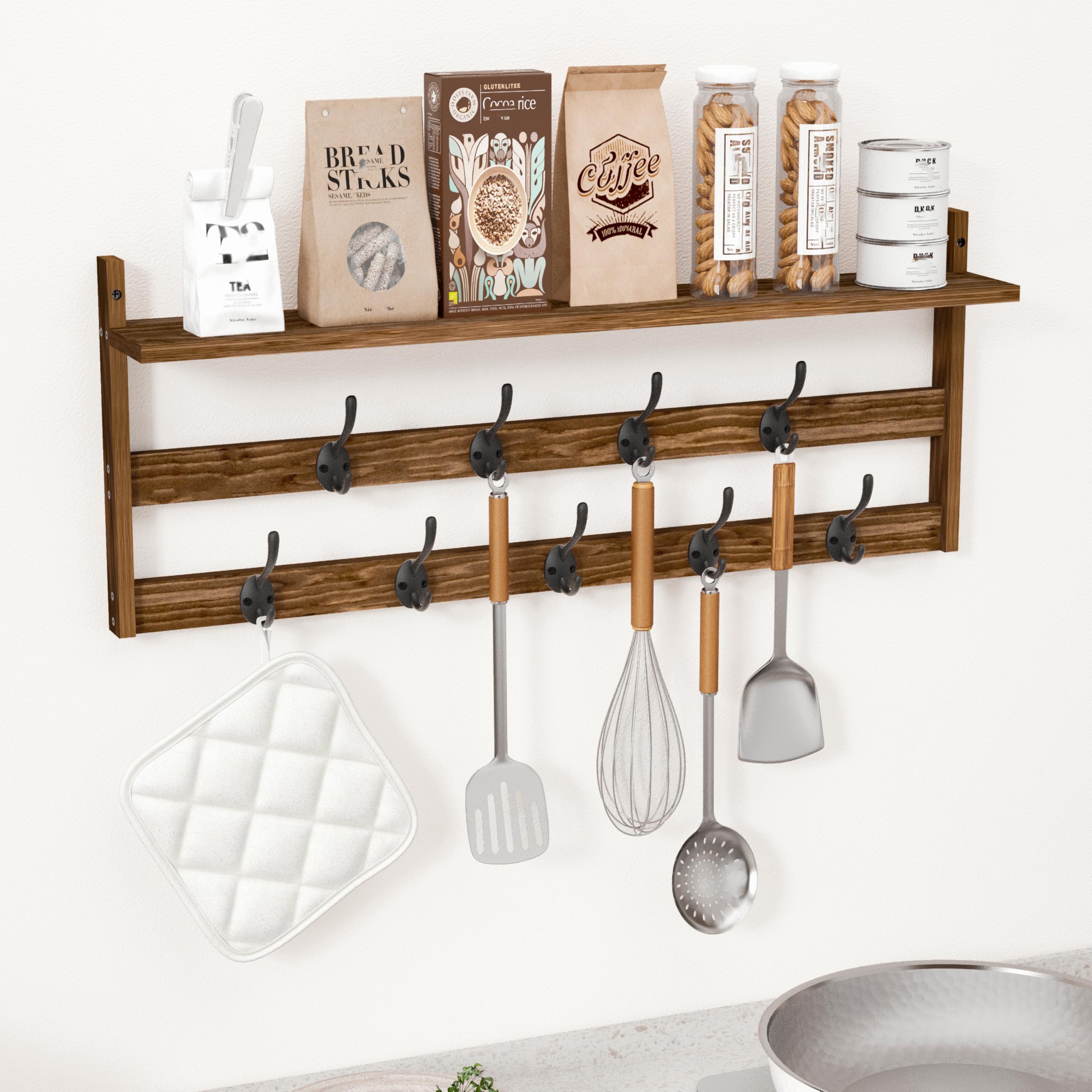 Installed AMBIRD coat rack on wall with hardware included