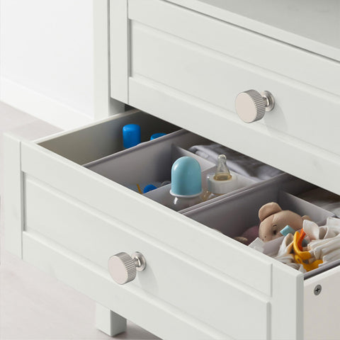 Packaging image of Amerdeco brushed nickel pulls protecting finish during delivery.
