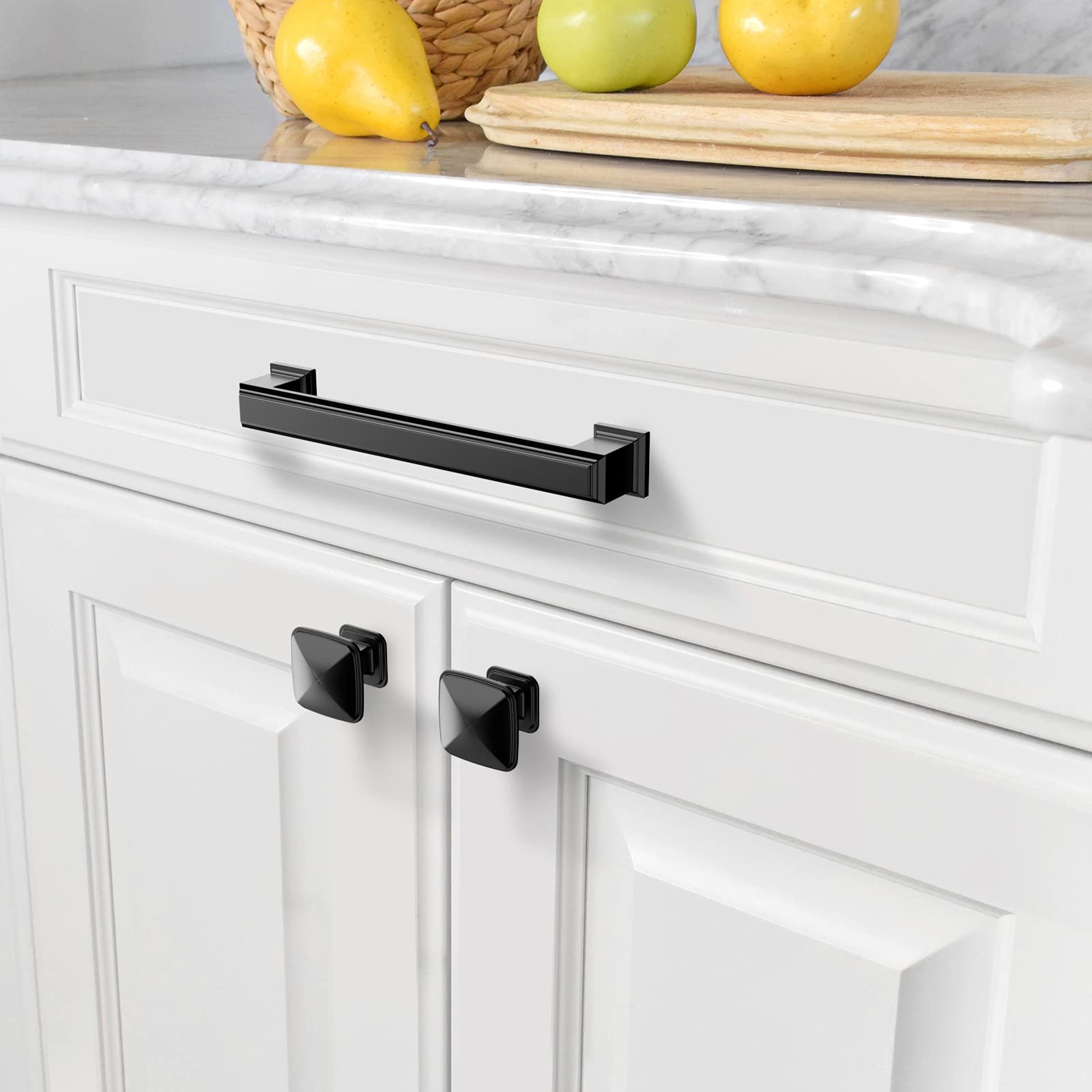 Amerdeco matte black pulls installed on a cabinet door for easy upgrade.