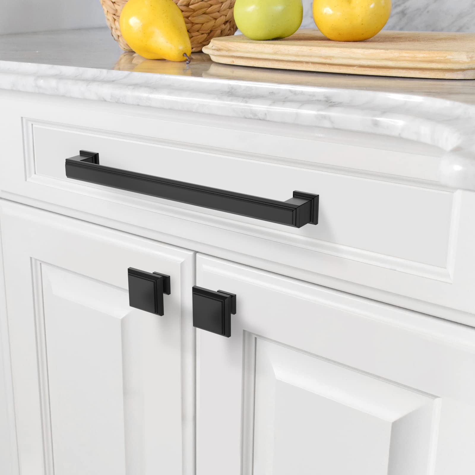 Amerdeco matte black pulls mounted on cabinetry provide clean, cohesive hardware.