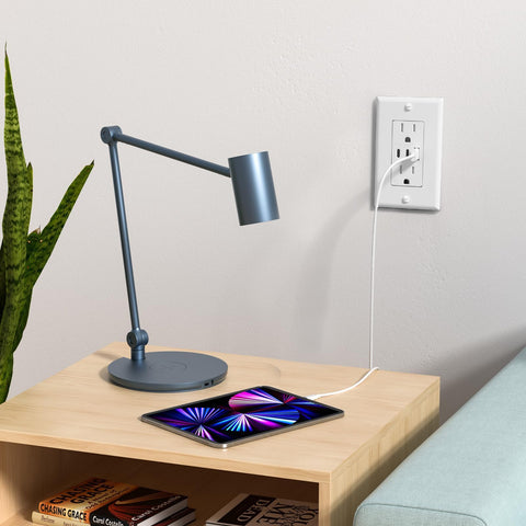 Amico outlet mounted in a tidy under-desk white setup.