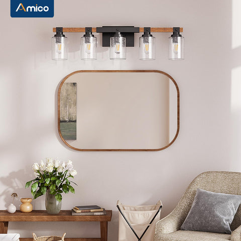 Amico bathroom lighting showcases bright, even illumination around a mirror.