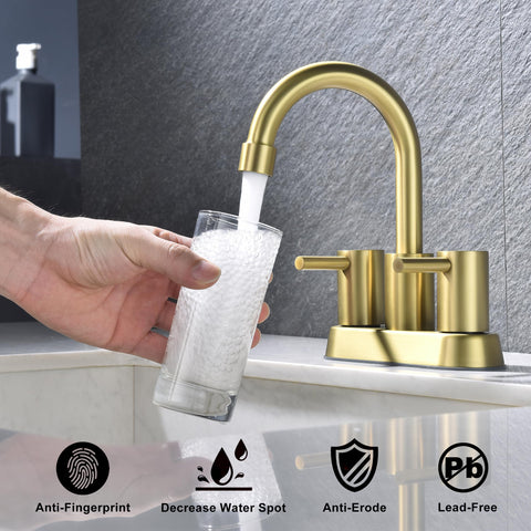 AmirLans brushed gold faucet with pop-up drain kit in view.