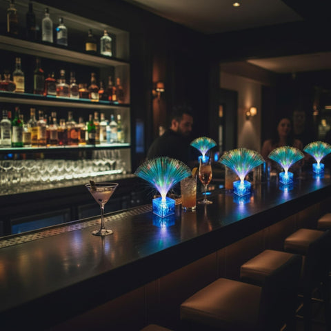 Amylove glow-in-blue fiber-optic centerpieces light aisles.