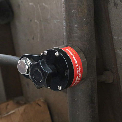ANER grounding magnet connector provides strong grip on flat or round workpieces.