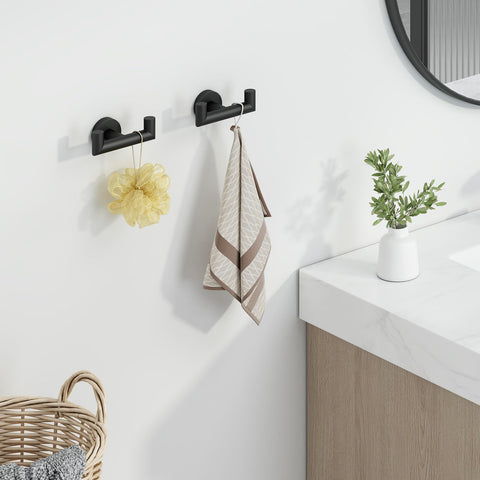 Angle Simple stainless steel robe hook close-up with matte black coating for durability.
