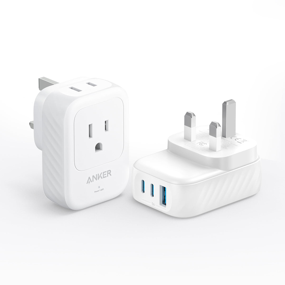 Anker travel adapter Type G UK front view with dual outlets and USB ports