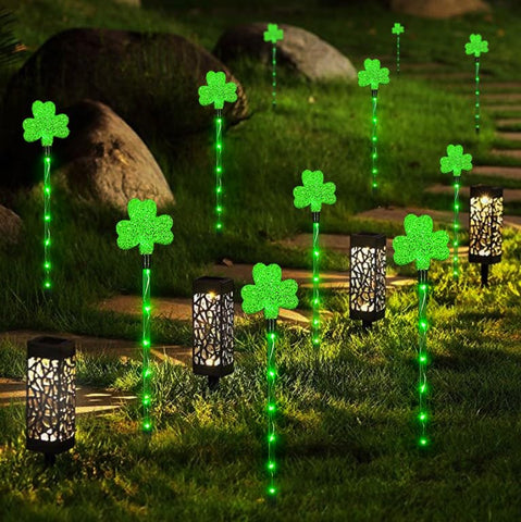 ANLTDTC garden walkway illuminated by shamrock lights for evenings
