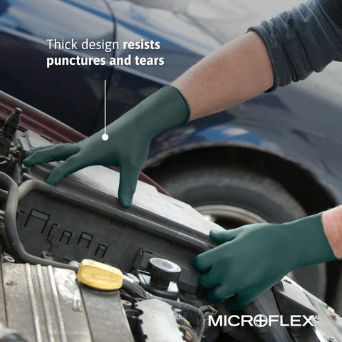 Gloves in automotive task setup, ideal for maintenance and assembly with visual visibility.