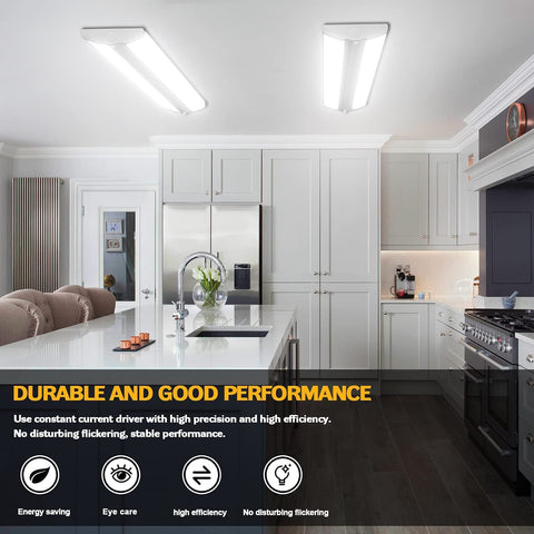AntLux 4ft wraparound light in workshop with tools and benches for clarity.