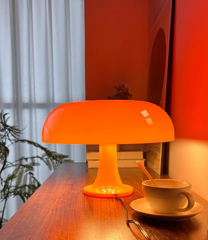 Anykonio orange mushroom lamp side view highlighting Italian-inspired design.