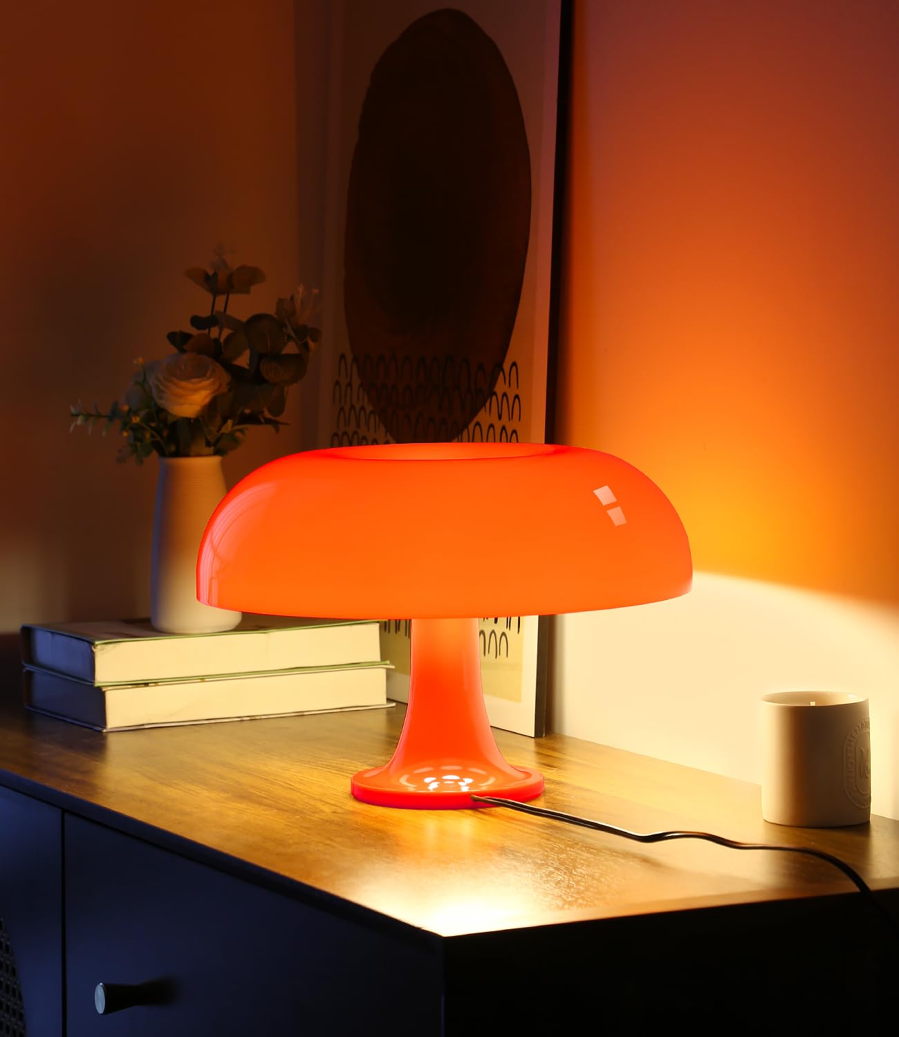 Anykonio orange mushroom lamp on a bedside table emitting warm ambient glow