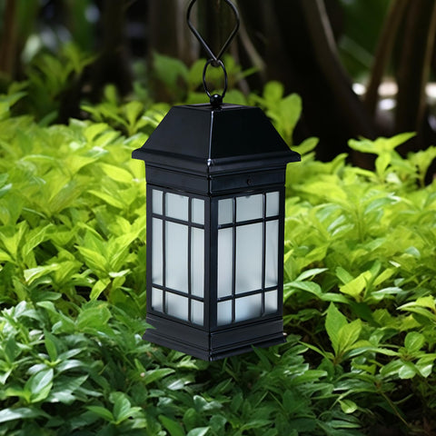 Anyperfect lantern with glass panels and flickering flame for cozy nights.