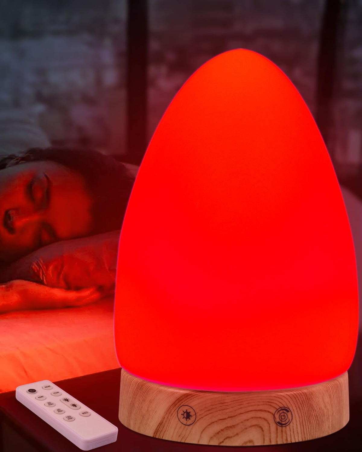 Aoife red light night light lamp on a bedside table creating a calm sleep ambiance.