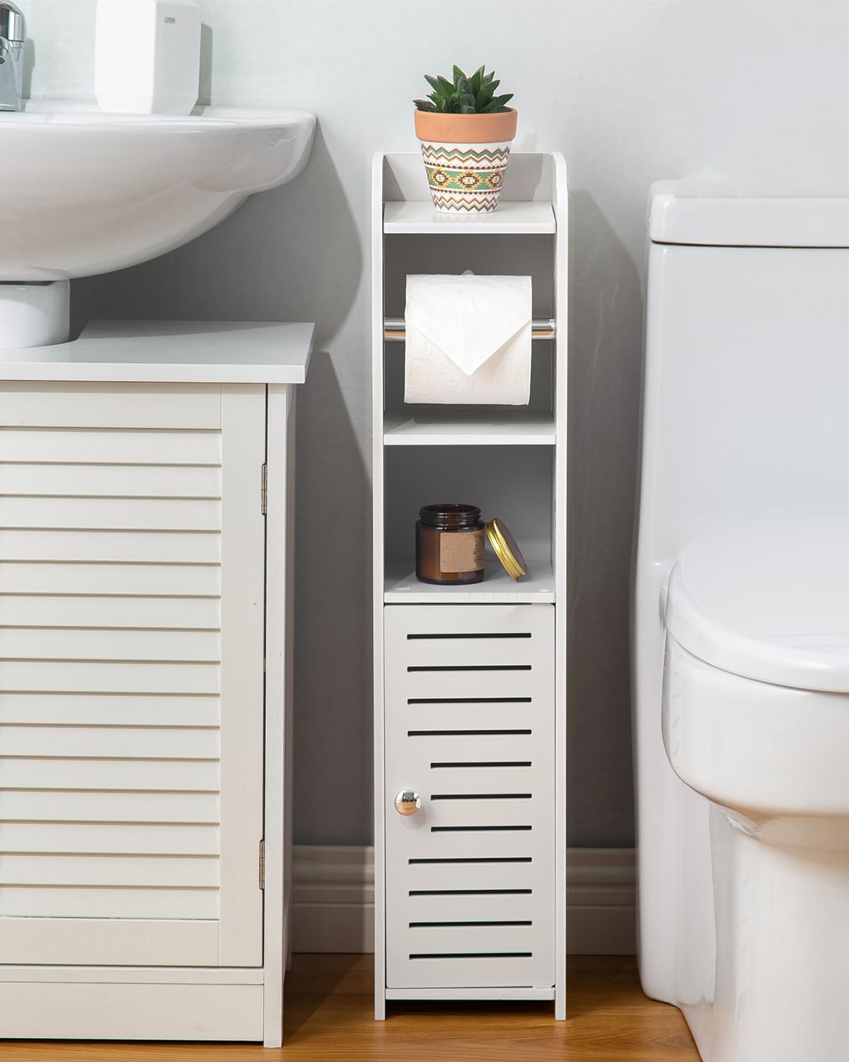 AOJEZOR Toilet Paper Holder Stand middle tier keeps rolls and supplies organized.