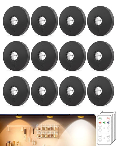 Aokpsrt rechargeable puck light installed in a kitchen cabinet for bright task lighting.