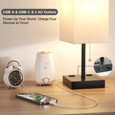 aooshine table lamp with AC outlets powering multiple devices at once.