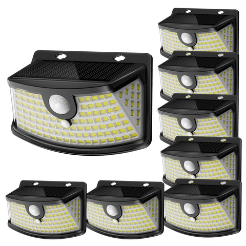 Aootek solar motion light at the front door enhances entry visibility.
