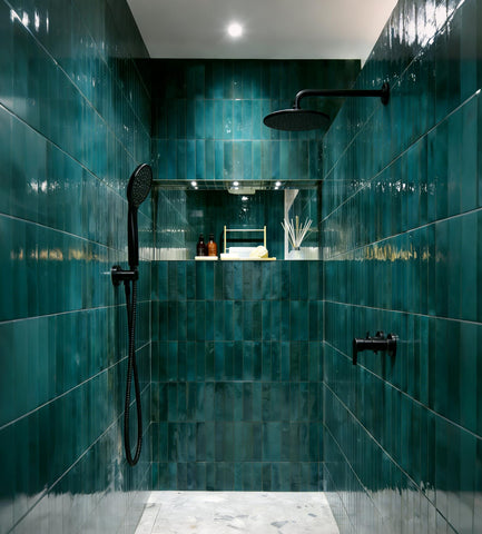 AQUAIAW bracket integrated with handheld shower head holder for convenient access.