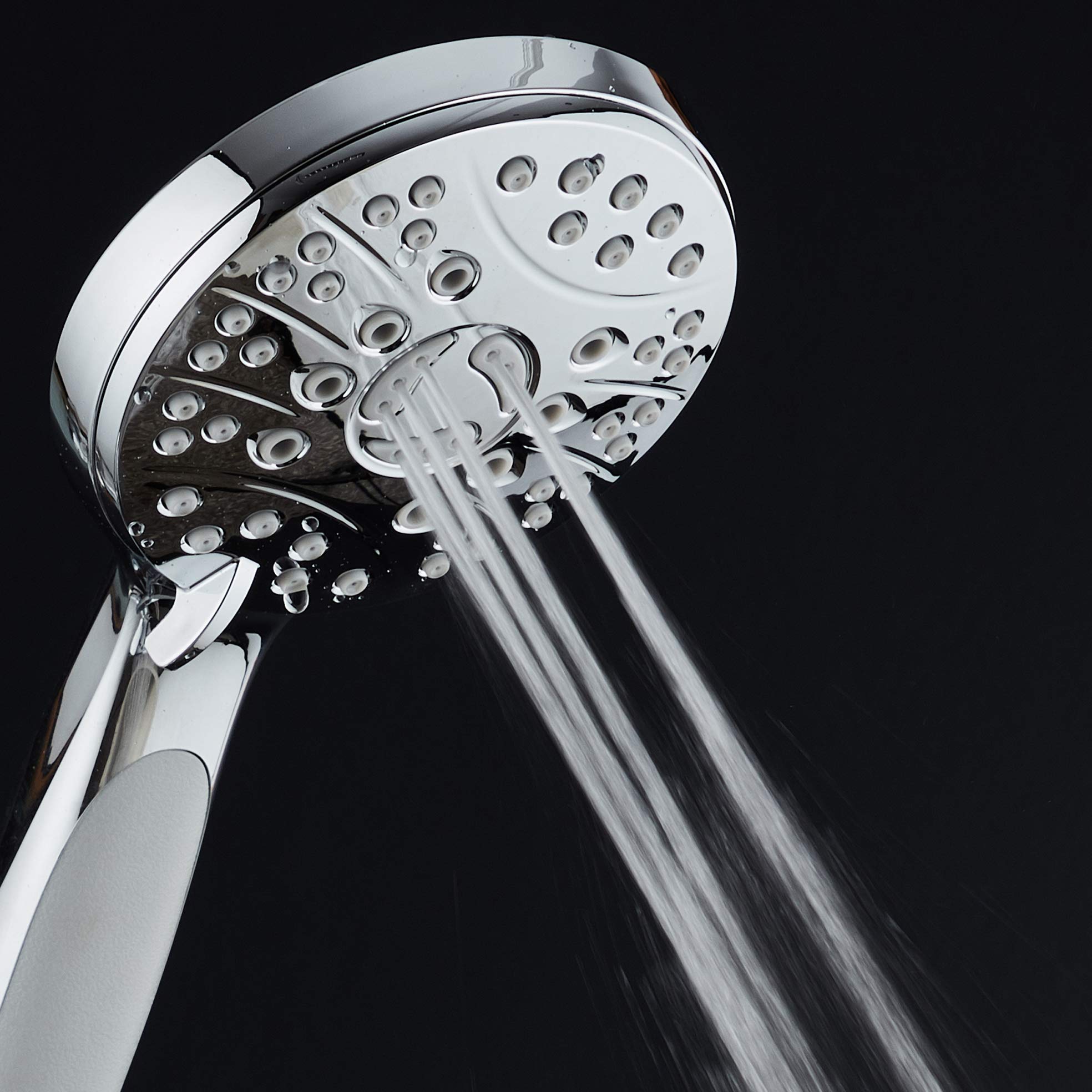 AquaSpa anti-clog rub-clean nozzles in chrome finish for easy maintenance.