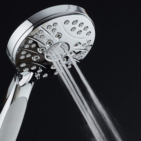 AquaSpa anti-clog rub-clean nozzles in chrome finish for easy maintenance.
