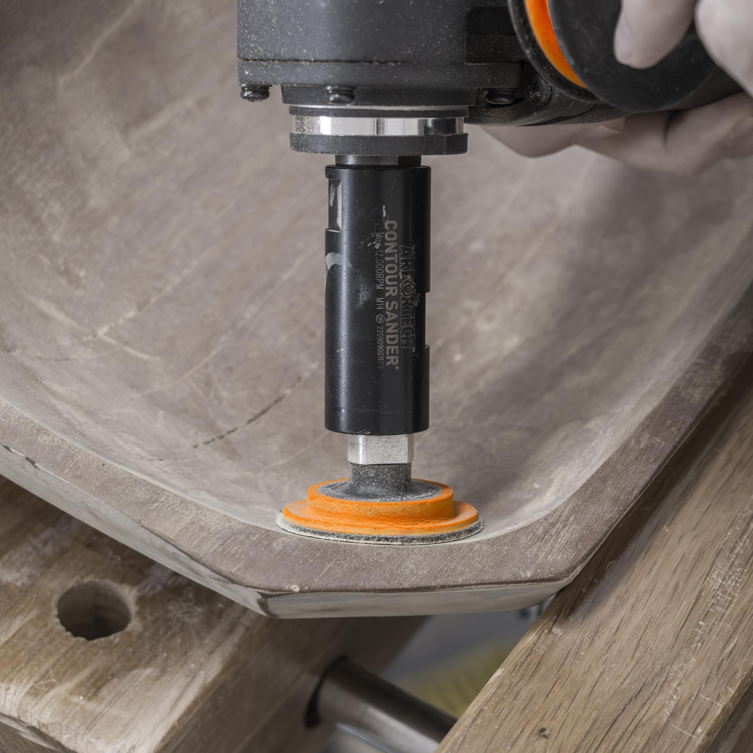 Arbortech Contour Sander attaches to standard angle grinders for easy setup.