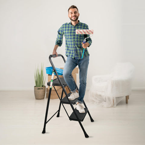 Arbusb ladder provides stable stance for reaching shelves.