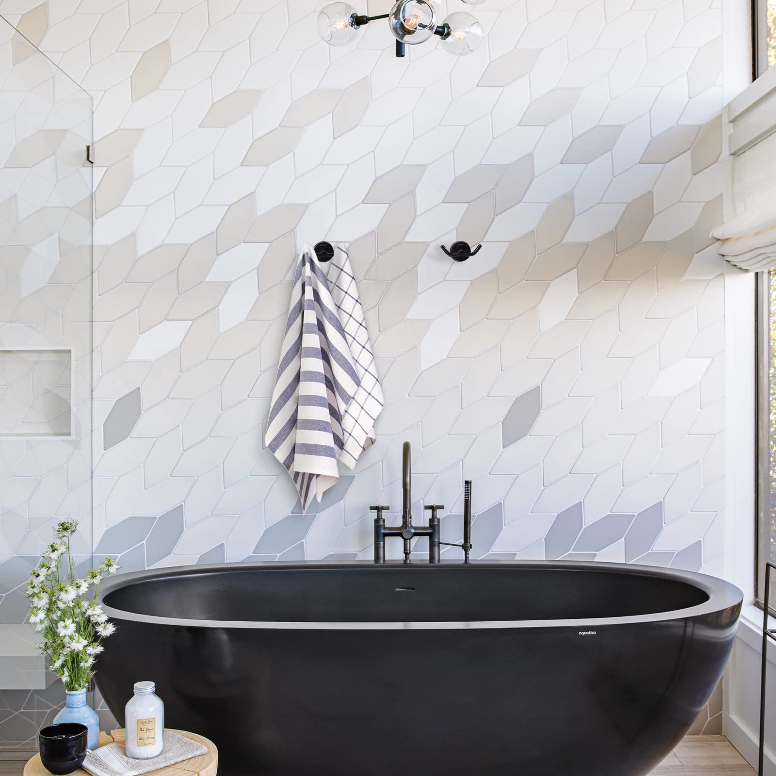 ARCORA heavy-duty towel hook mounted on wall with towels hanging.