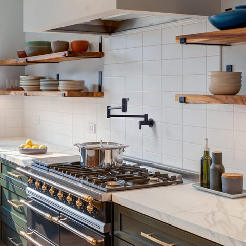 ARCORA double joint swing arms offer flexible reach beside the stove.