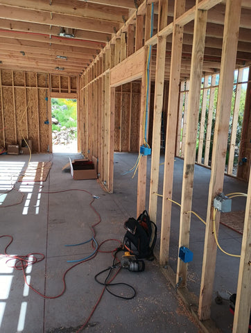 Yellow insulated jacket shown on Arizona Electrical Solutions NM-B cable.