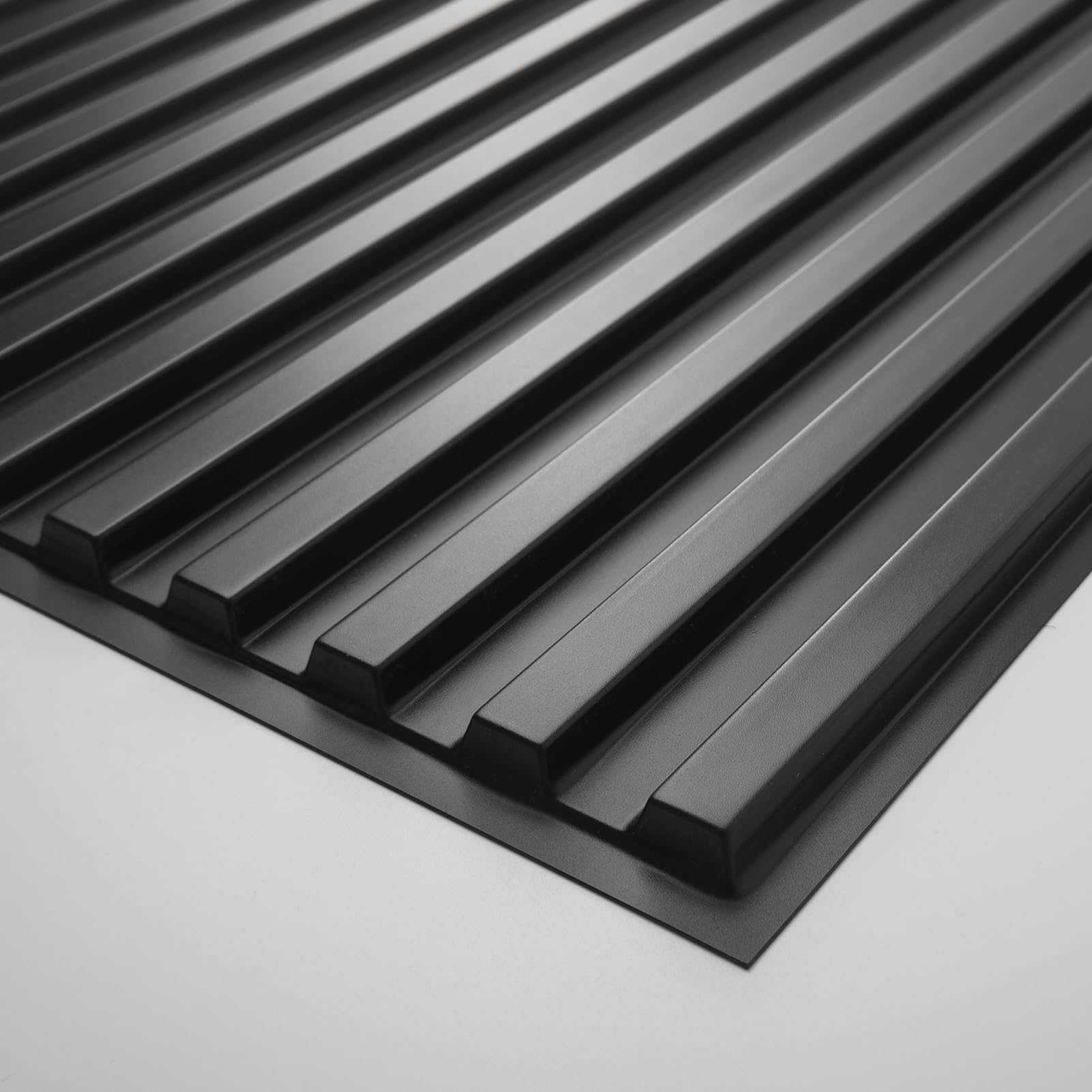 Art3d black wall panel close-up, durable PVC with paintable surface.