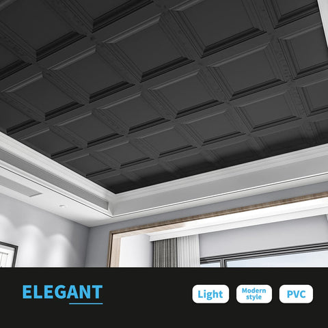 Art3d 24x24 black ceiling tile being placed into a grid system