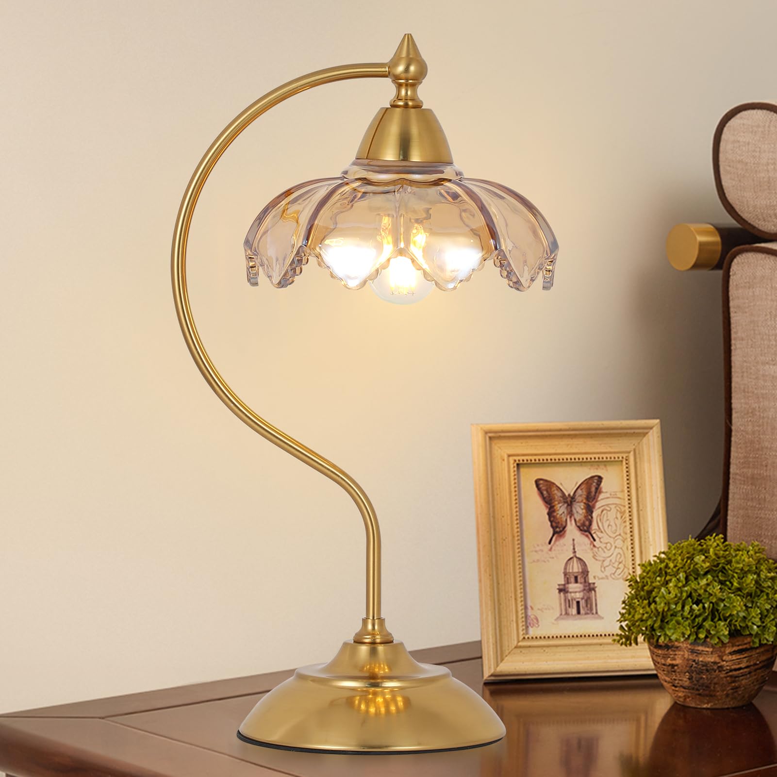 Artmooy amber flower shade table lamp provides warm, glare-free light for nightstands.