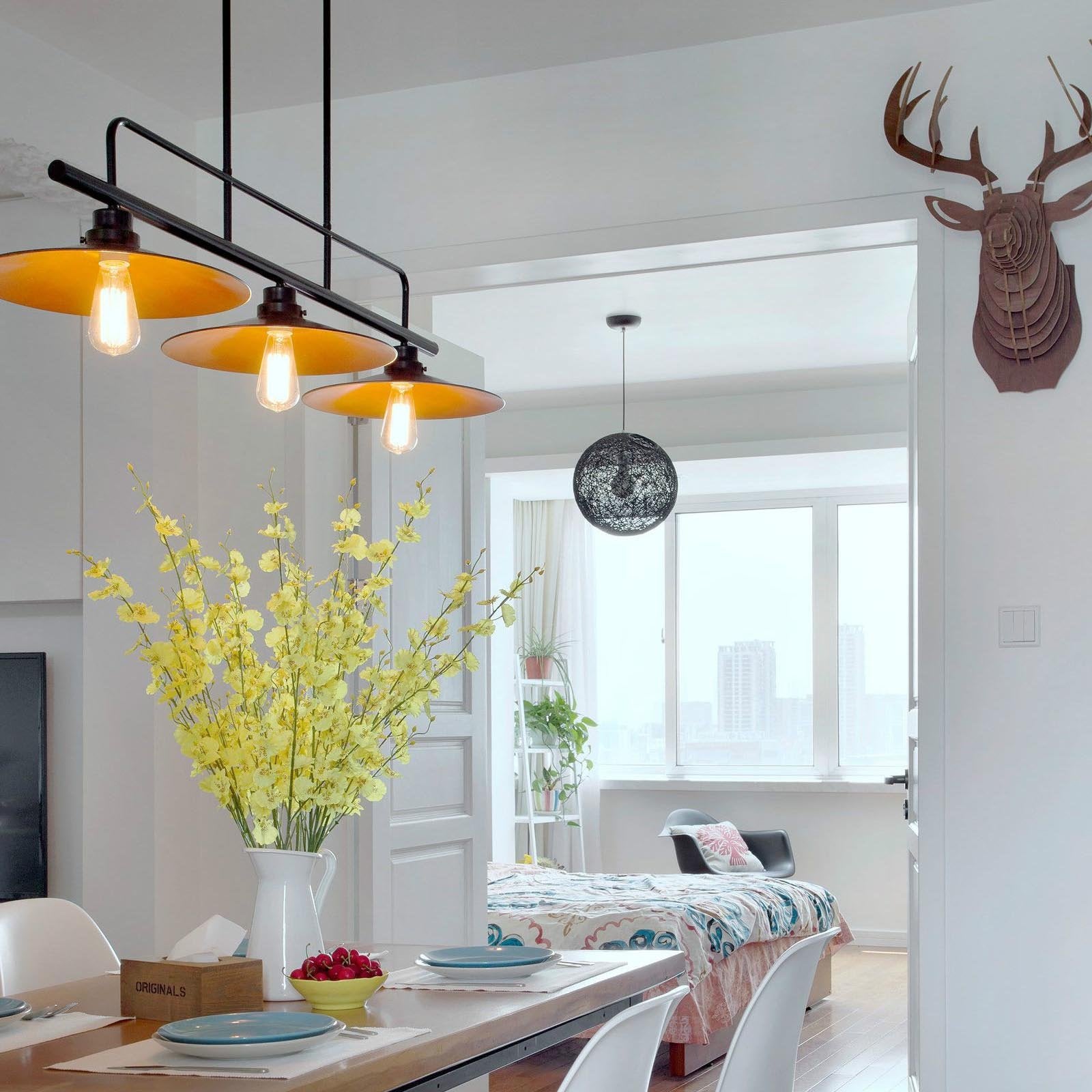 Ascher 280-degree beam LED filament bulb evenly lights large rooms.