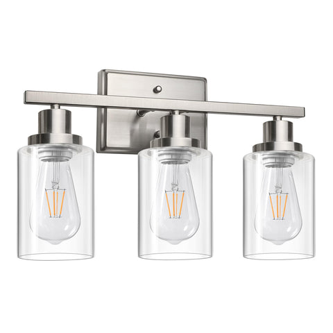 Ascher vanity light with three clear glass shades brightens bathroom mirror areas.