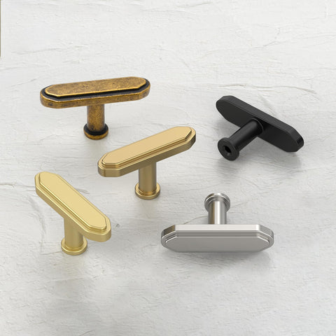Asidrama brushed antique brass dresser knob in stylish bedroom setup.