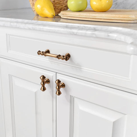 Asidrama brushed-brass cabinet pull highlights furniture with a warm, refined finish.