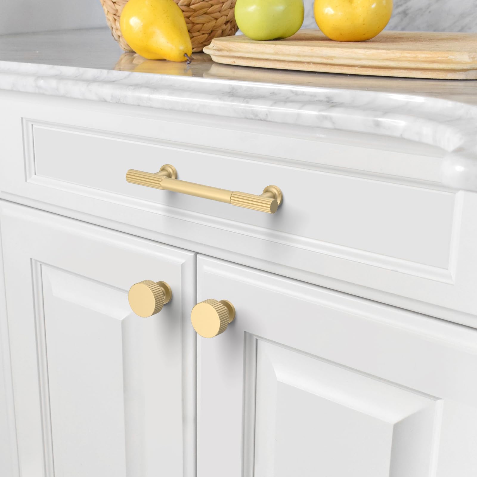 Asidrama brushed gold cabinet handle installed on a cabinet illustrating easy mounting.