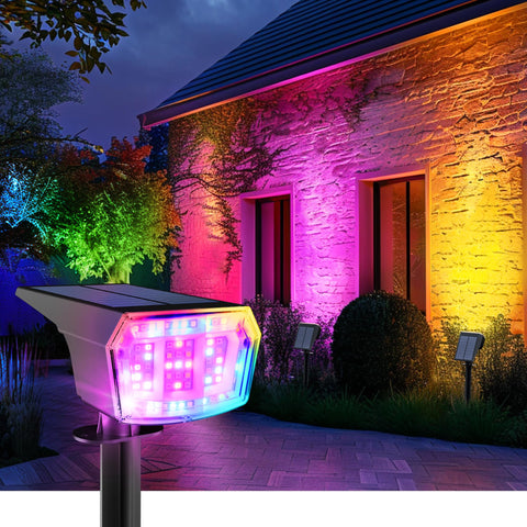 Auderwin solar spot light on garden path with bright RGB colors