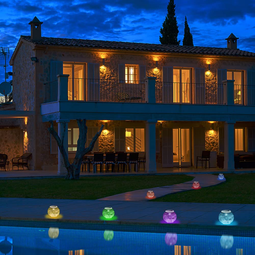 Aukora solar-powered garden lamp glowing at dusk